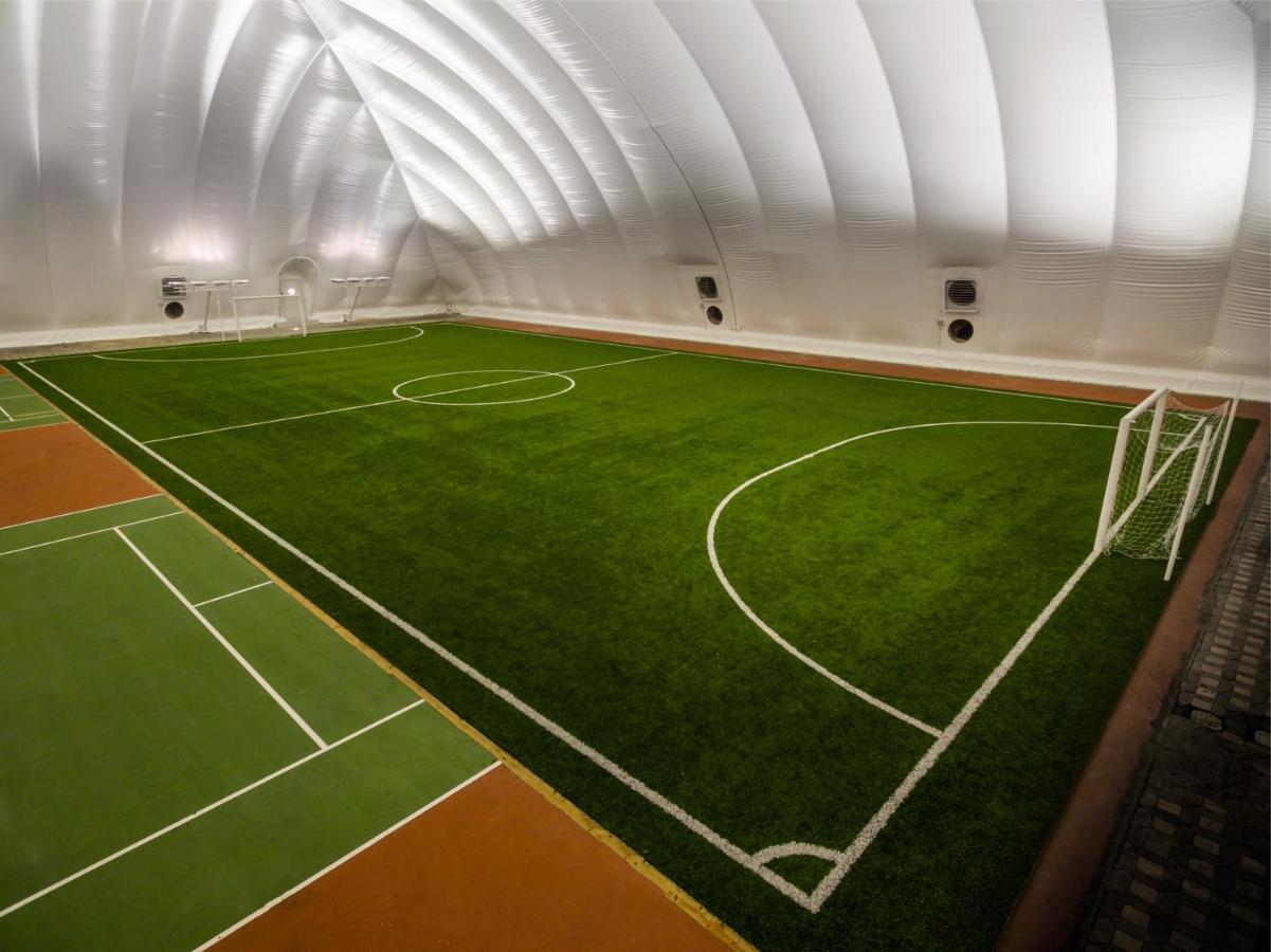 Officers Club & Hotel Abu Dhabi Exterior foto The indoor football pitch