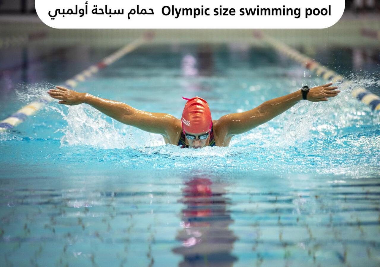 Officers Club & Hotel Abu Dhabi Exterior foto Olympic size swimming pool